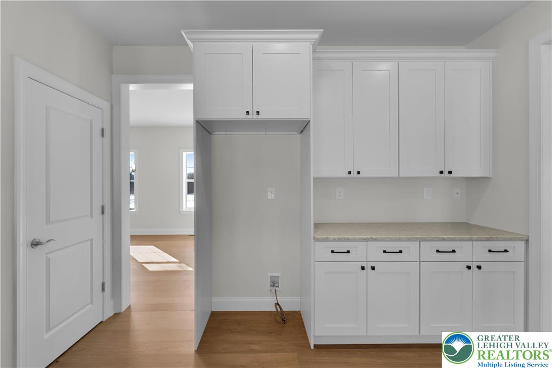 1480 Bushkill Center Road Nazareth, PA 18064 - Photo 19 of 55 a view of kitchen with white wooden cabinets