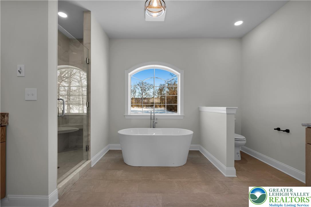 1480 Bushkill Center Road Nazareth, PA 18064 - Photo 29 of 55 a living room with a couch and a window
