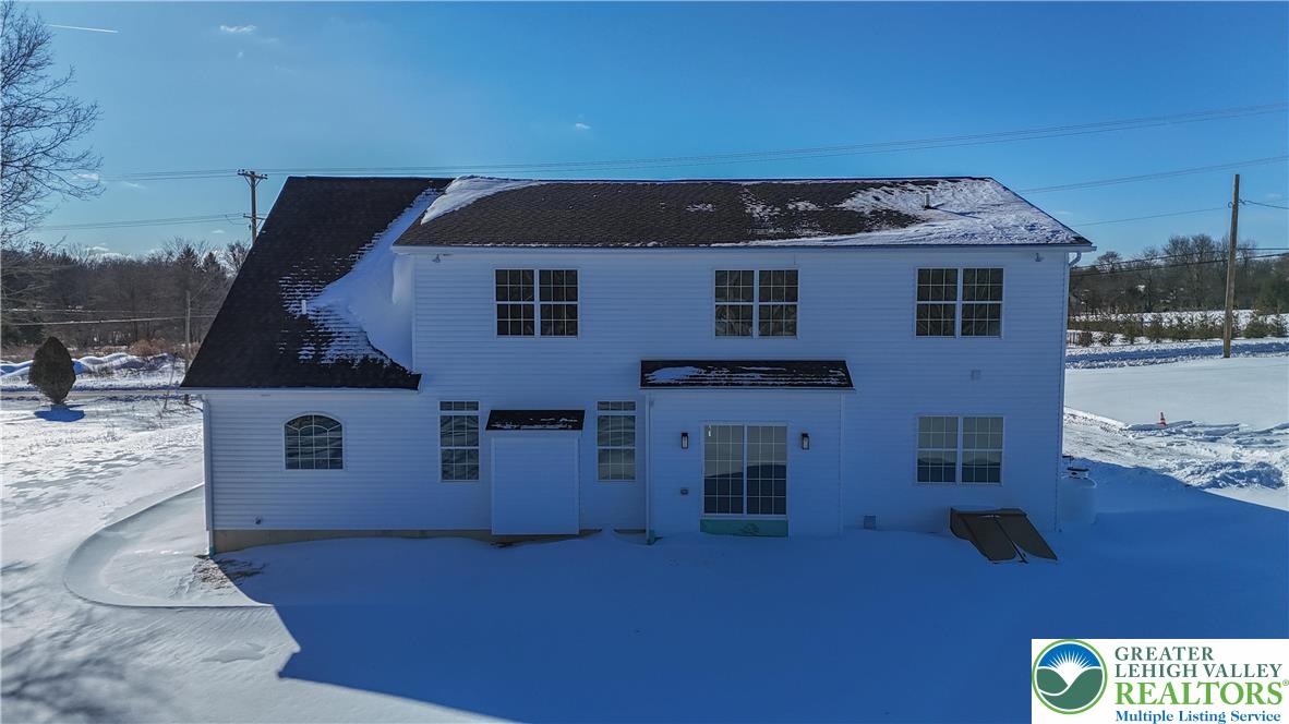 1480 Bushkill Center Road Nazareth, PA 18064 - Photo 5 of 55 a front view of a house with a yard