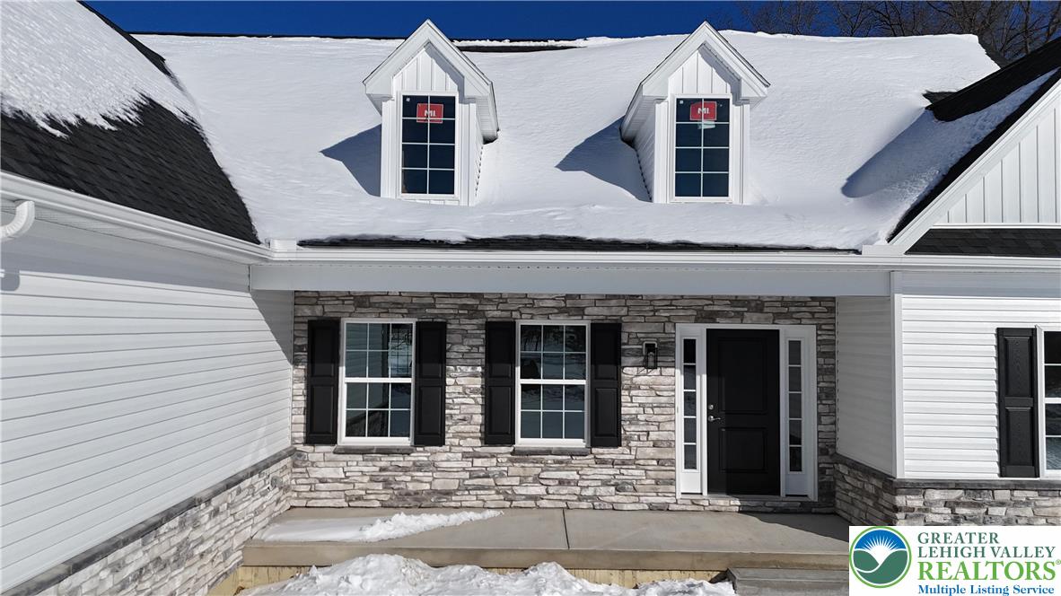 1480 Bushkill Center Road Nazareth, PA 18064 - Photo 9 of 55 a front view of a house with a yard