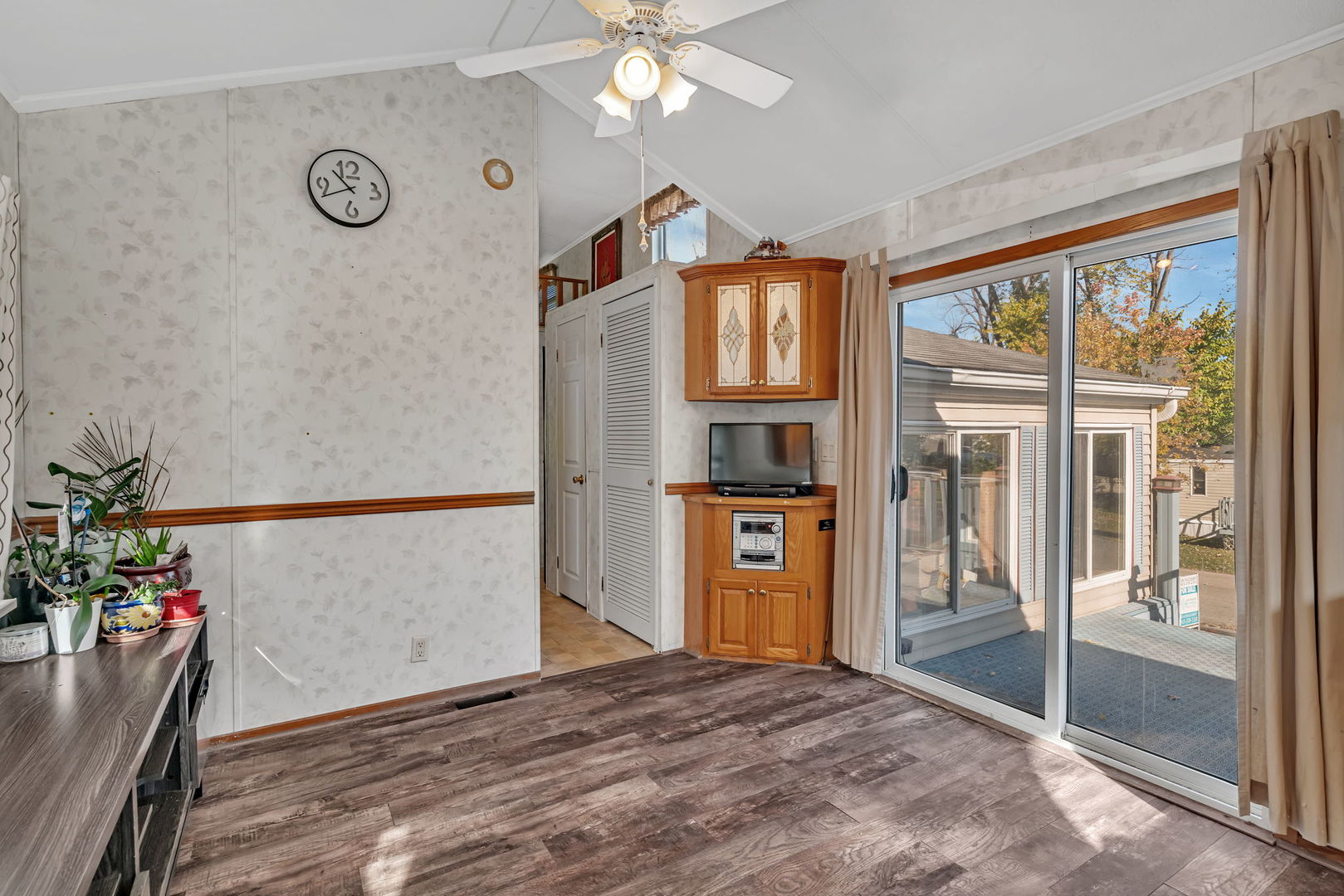64 Fossil Ridge Road Wilmington, IL 60481 - Photo 12 of 40 a view of livingroom with furniture cabinet and front door