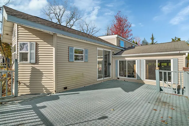 a view of a house with a sitting area