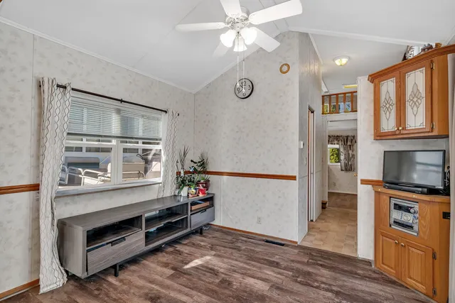 a kitchen with stainless steel appliances a stove and a refrigerator