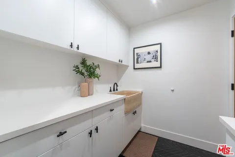 a view of cabinets and wooden floor