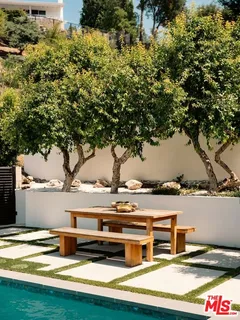 a view of a yard with an outdoor space