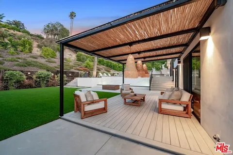 a view of porch with seating space