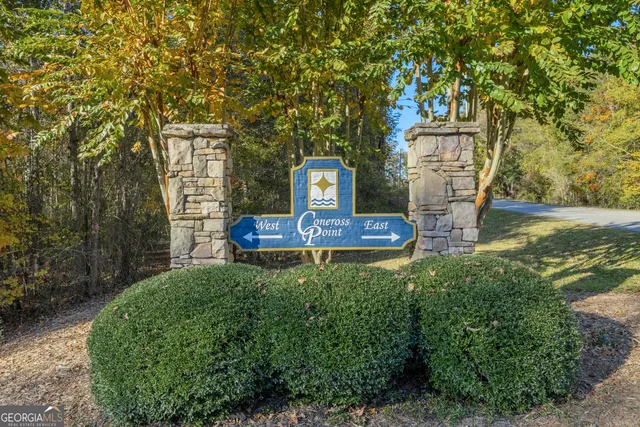 a front view of a house with a yard fountain