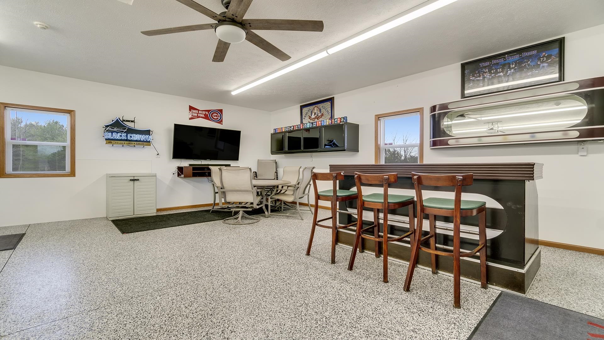 11764 North Tower Road Byron, IL 61010 - Photo 27 of 38 a view of a livingroom with furniture and a flat screen tv