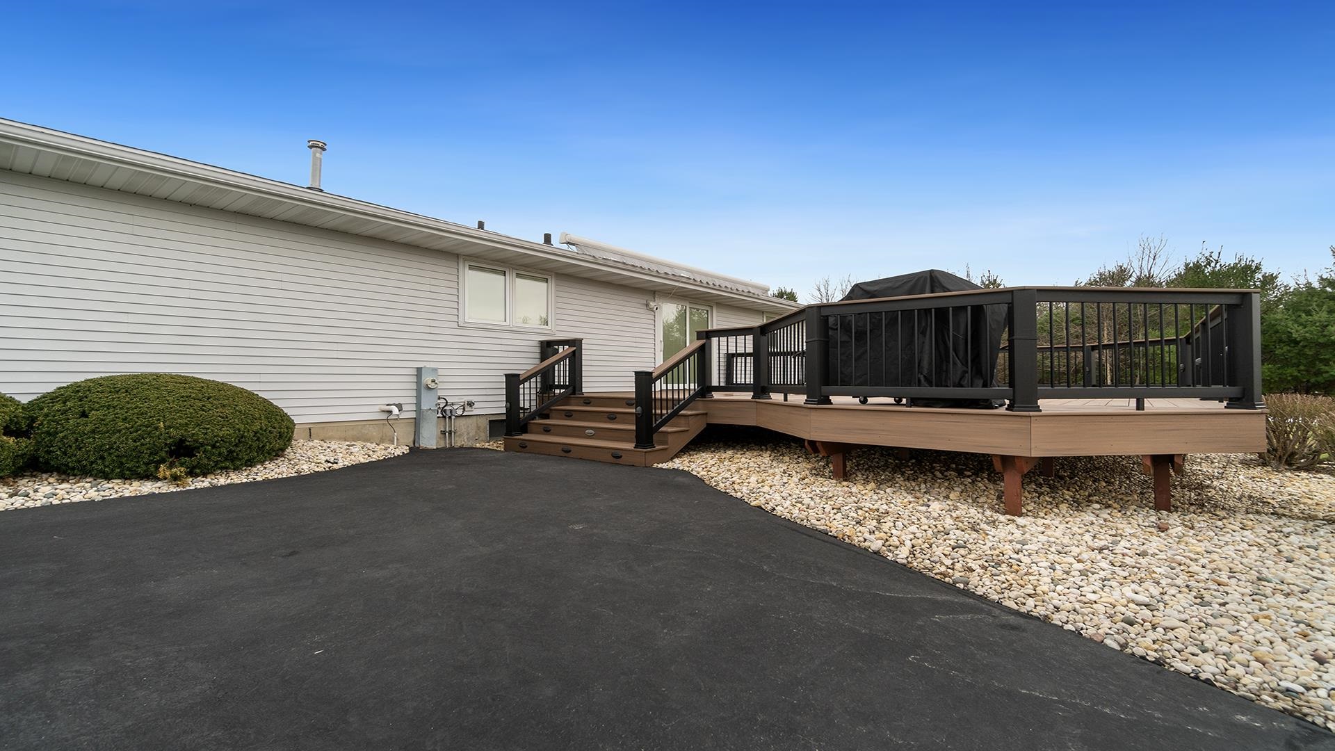 11764 North Tower Road Byron, IL 61010 - Photo 29 of 38 a view of a back yard of a house