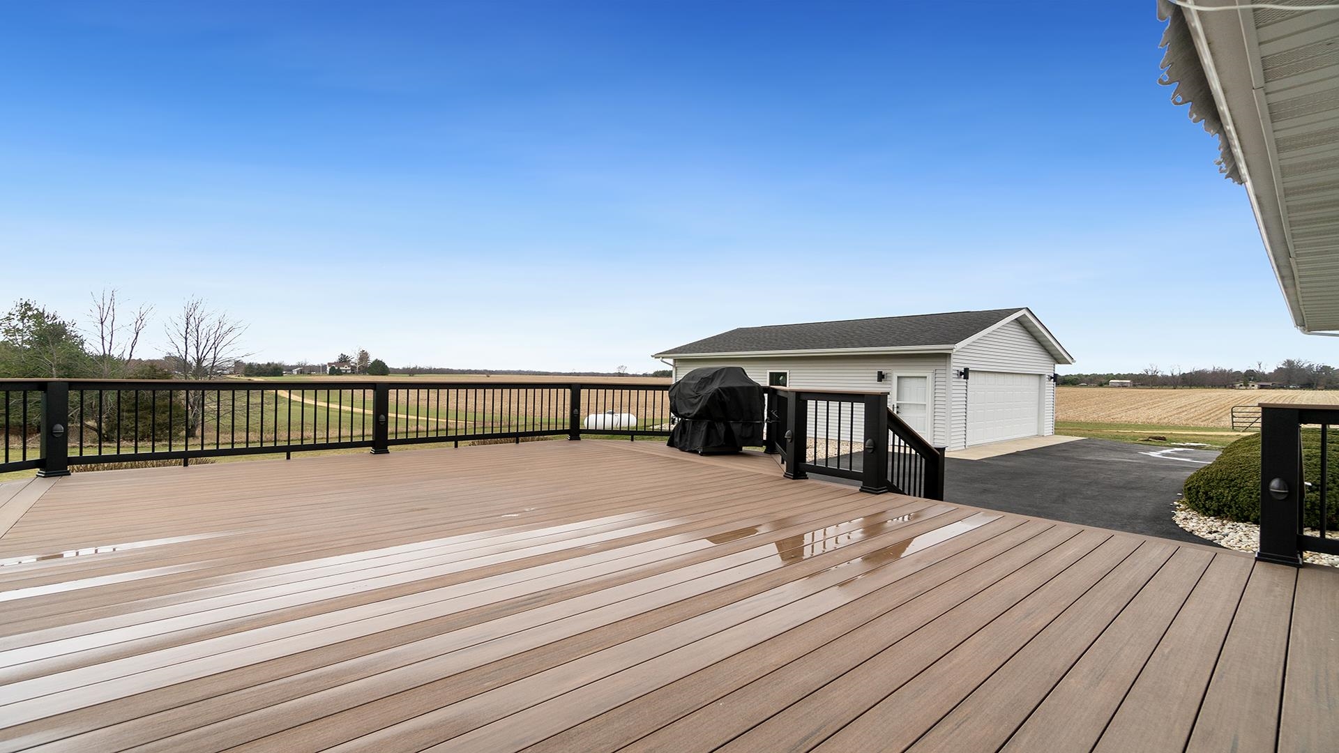 11764 North Tower Road Byron, IL 61010 - Photo 31 of 38 a view of a terrace with wooden floor