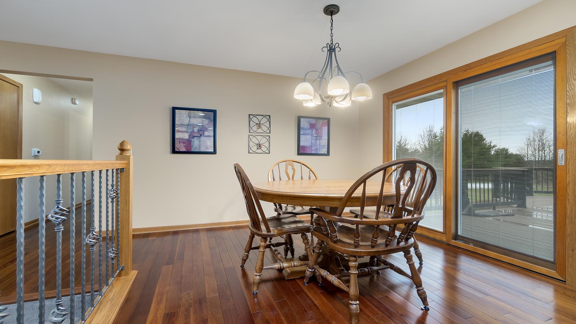 11764 North Tower Road Byron, IL 61010 - Photo 9 of 38 a view of a dining room with furniture window and wooden floor