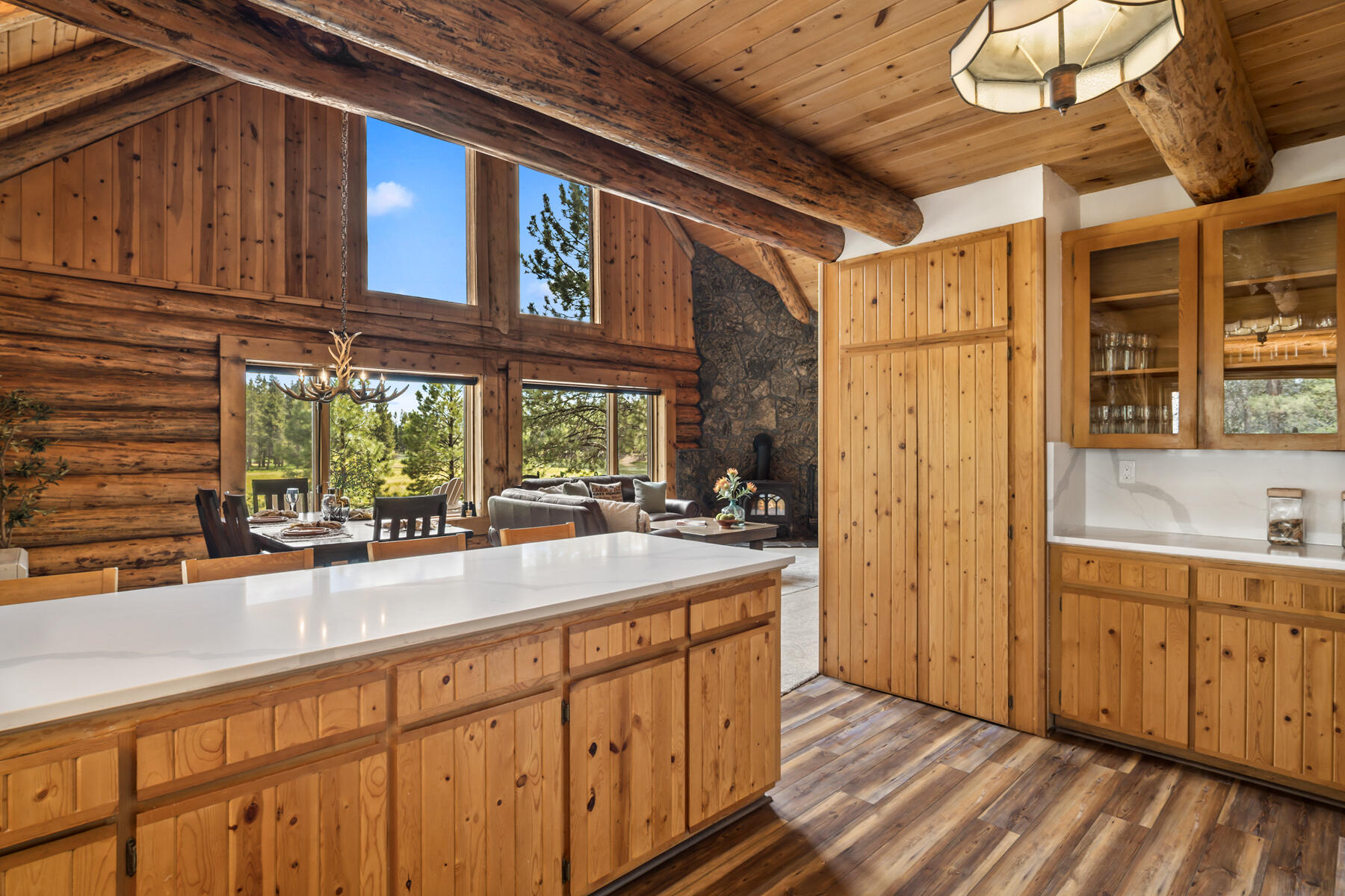 17026 Sharp Drive Bend, OR 97707 - Photo 32 of 72 a kitchen with a sink and wooden cabinets