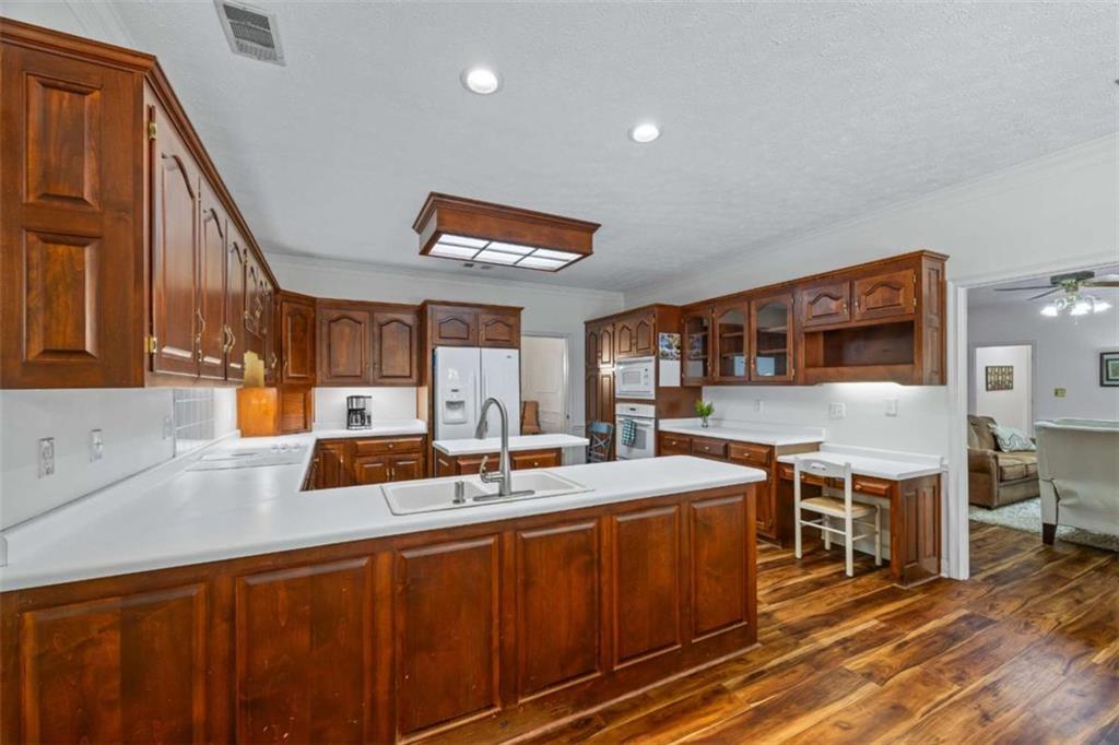 750 Staghorn Trail Nicholson, GA 30565 - Photo 12 of 55 a kitchen with a sink counter top space and appliances