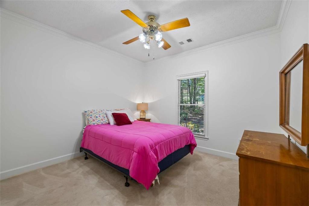 750 Staghorn Trail Nicholson, GA 30565 - Photo 25 of 55 a bedroom with a bed and window