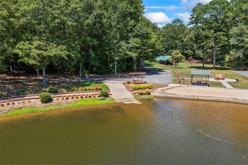 750 Staghorn Trail Nicholson, GA 30565 - Photo 49 of 55 a view of a swimming pool with a yard