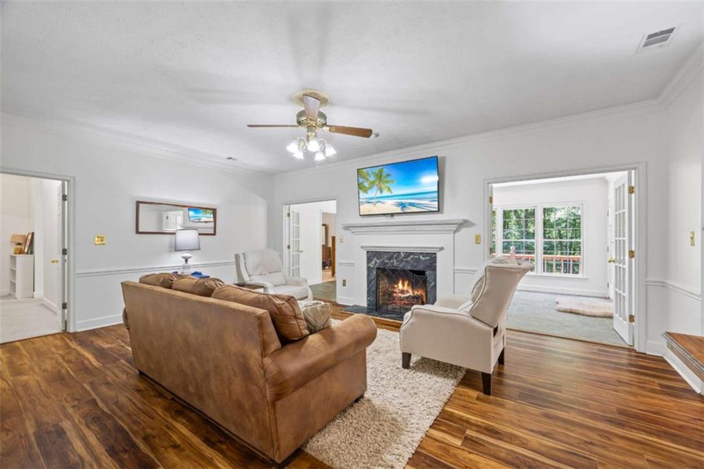 750 Staghorn Trail Nicholson, GA 30565 - Photo 8 of 55 a living room with furniture and a fireplace