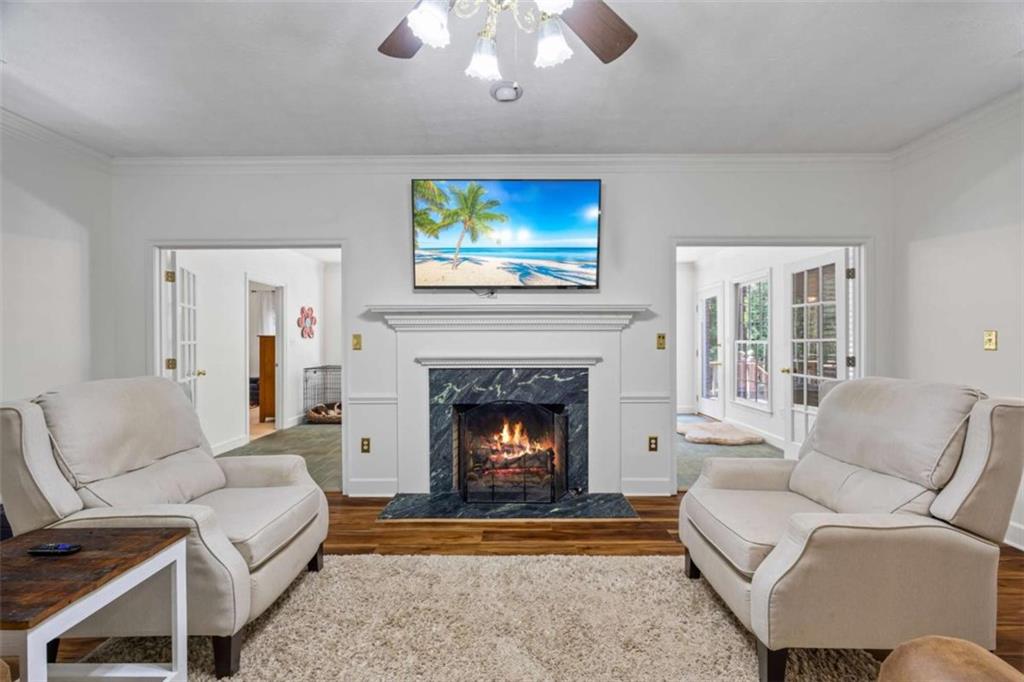 750 Staghorn Trail Nicholson, GA 30565 - Photo 10 of 55 a living room with furniture and a fireplace