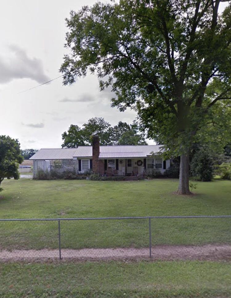 a house view with a garden
