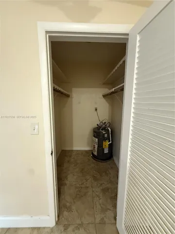 an aerial view of a houses with a street
