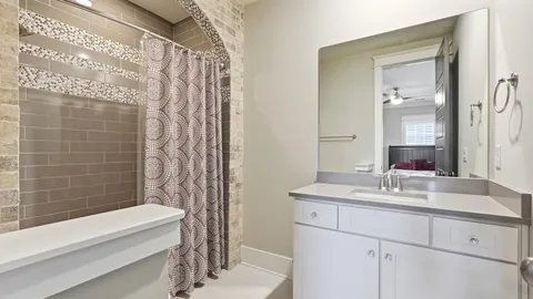 a living room with furniture gym equipment and a window