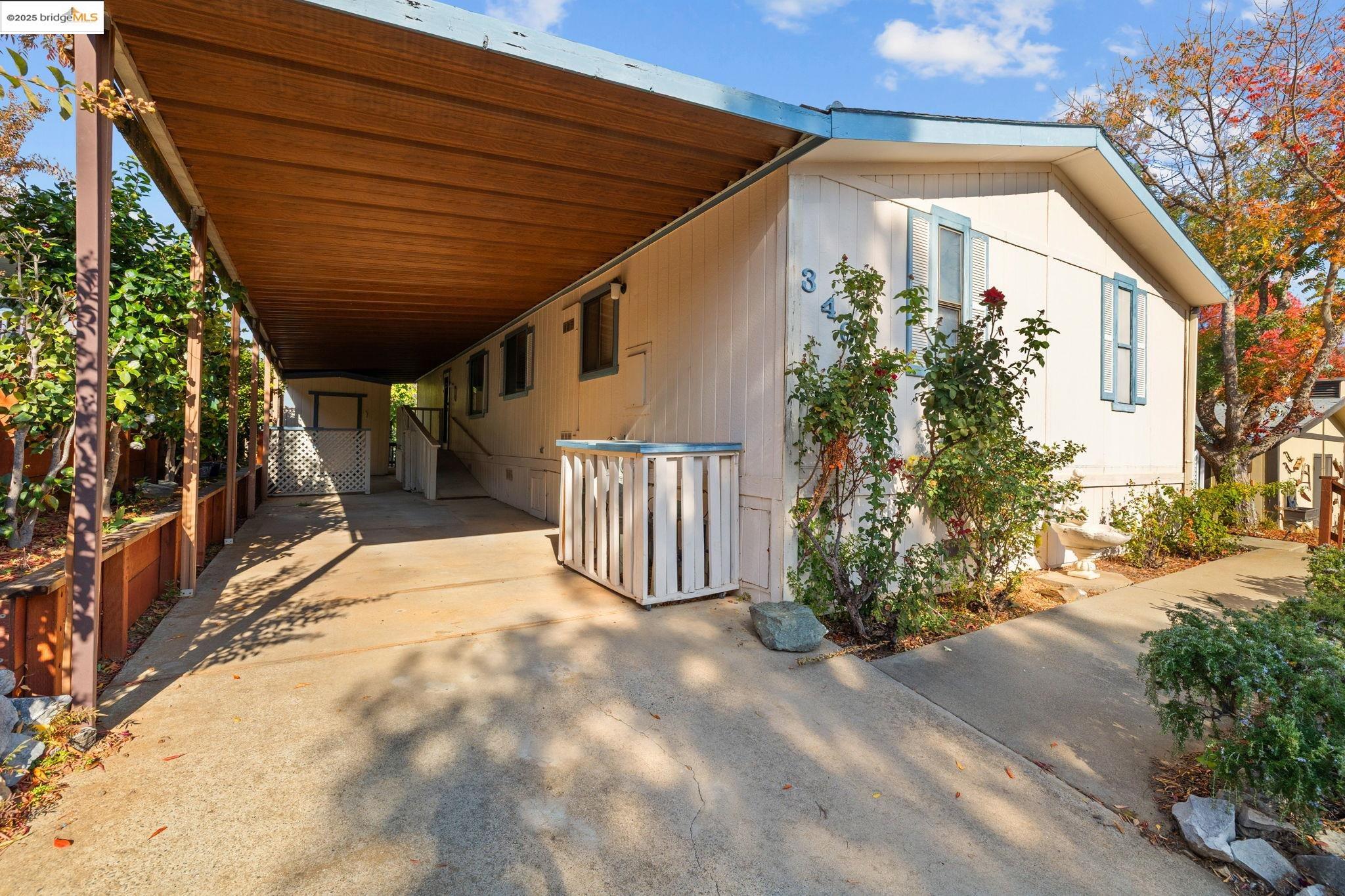 18717 Mill Villa Road, Unit 340 Jamestown, CA 95327 - Photo 20 of 21 a view of backyard with plants and trees
