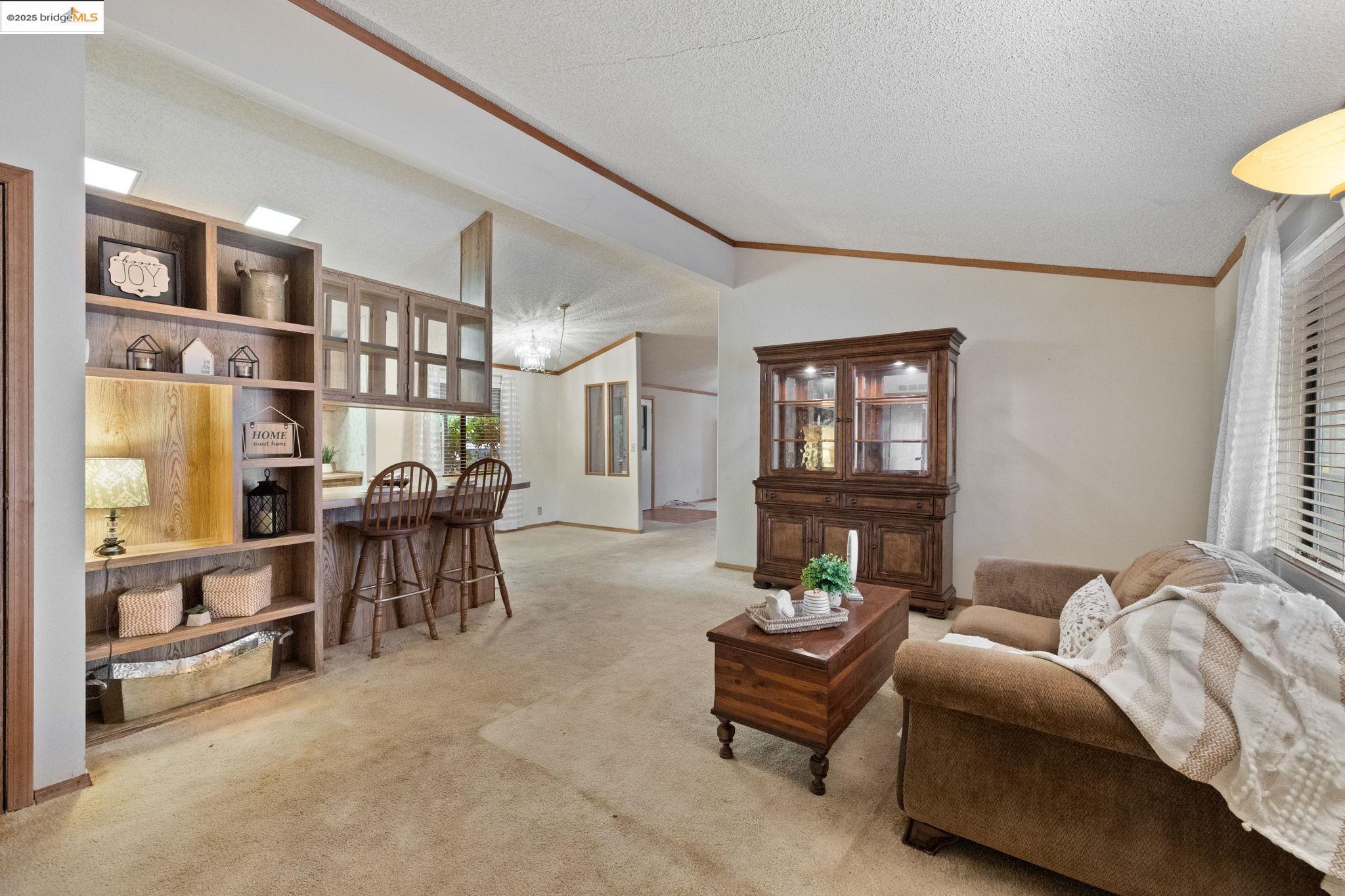 18717 Mill Villa Road, Unit 340 Jamestown, CA 95327 - Photo 3 of 21 a living room with furniture and a window