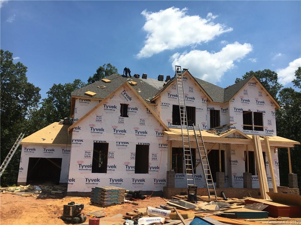 10001 Sunset Ridge, Unit 146 Midland, NC 28107 - Photo 1 of 2 a view of multiple houses with a street