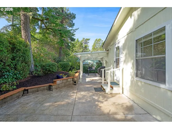 a view of a house with a garden