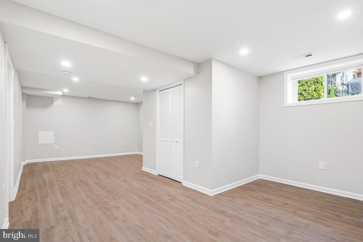 1446 Roxanna Road Northwest Washington, DC 20012 - Photo 23 of 32 Bright and spacious basement retreat.