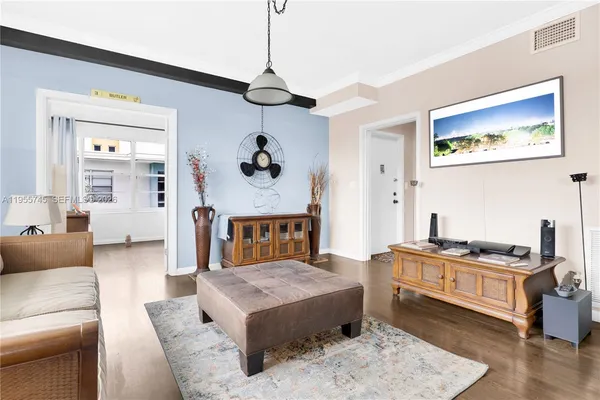 a living room with furniture and a window