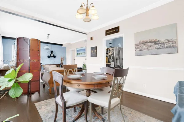 a view of a dining room with furniture