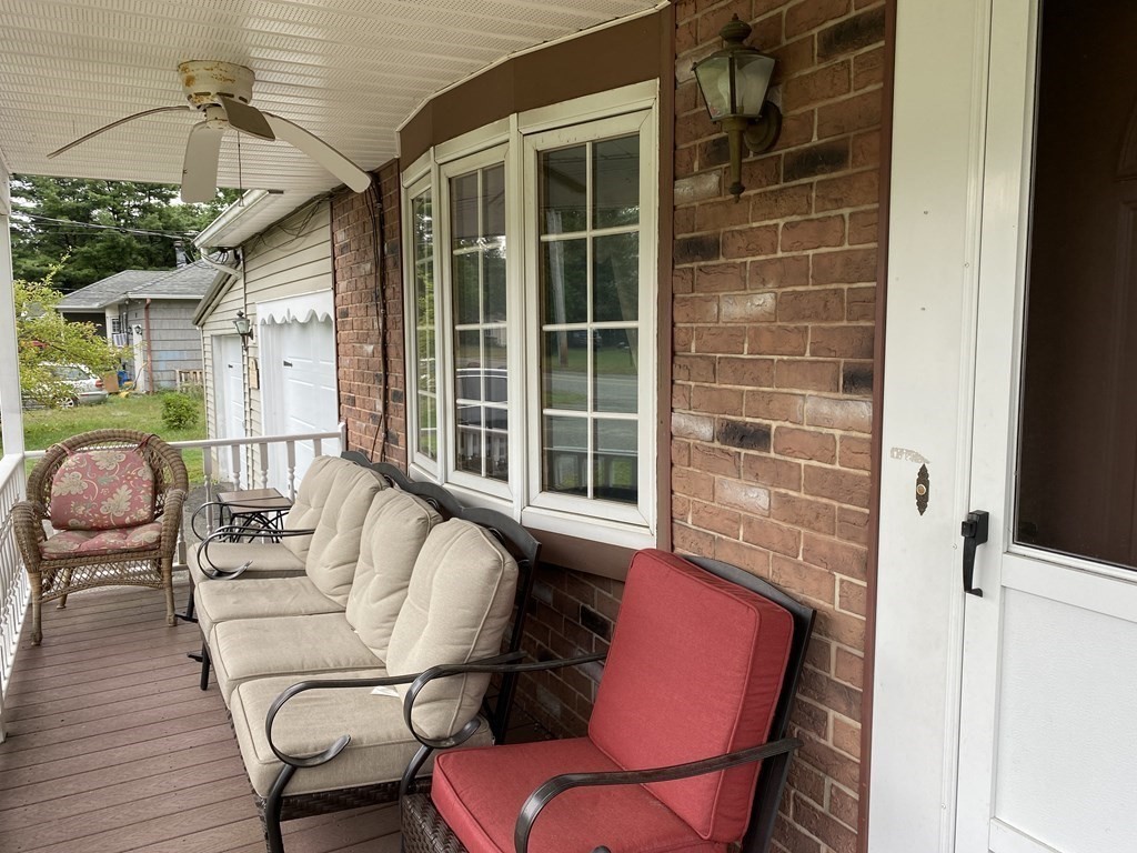 25 Gould Road Ware, MA 01082 - Photo 8 of 35 a balcony with table and chairs