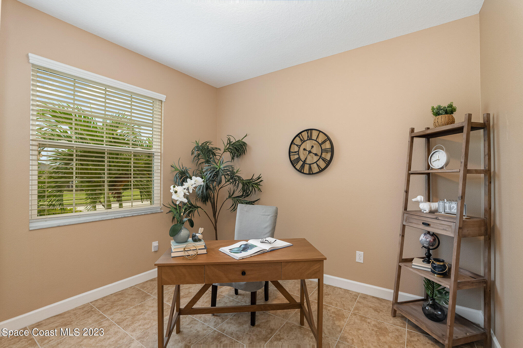 3545 Sansome Circle Melbourne, FL 32940 - Photo 13 of 27 a view of a workspace with furniture