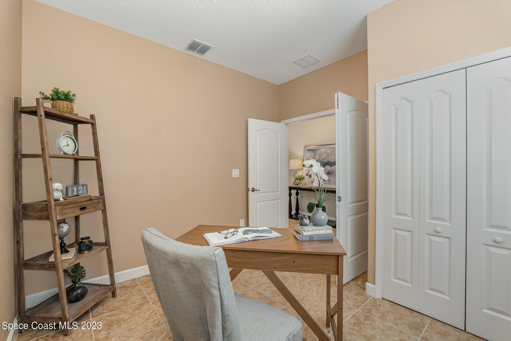 3545 Sansome Circle Melbourne, FL 32940 - Photo 14 of 27 a room with a table and chairs