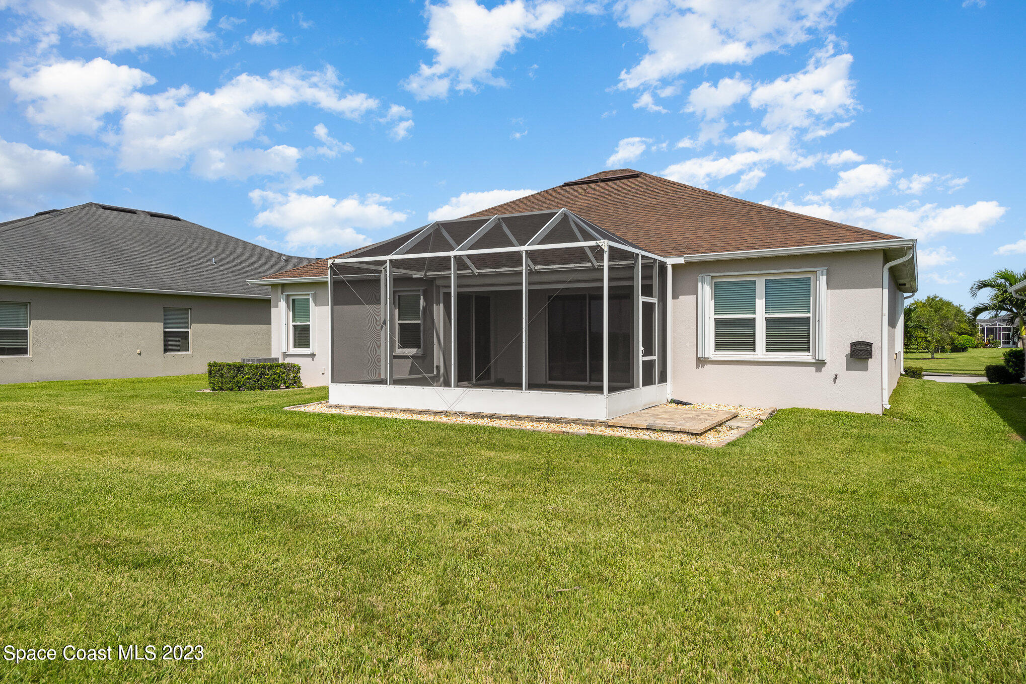 3545 Sansome Circle Melbourne, FL 32940 - Photo 25 of 27 a view of a house with a backyard
