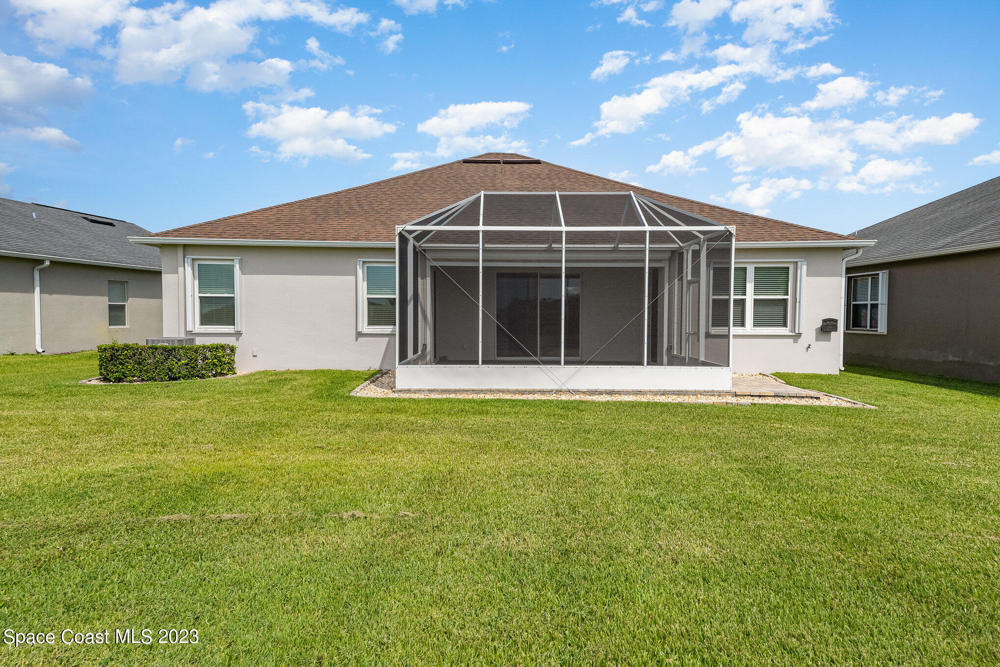 3545 Sansome Circle Melbourne, FL 32940 - Photo 26 of 27 a view of a house with a garden