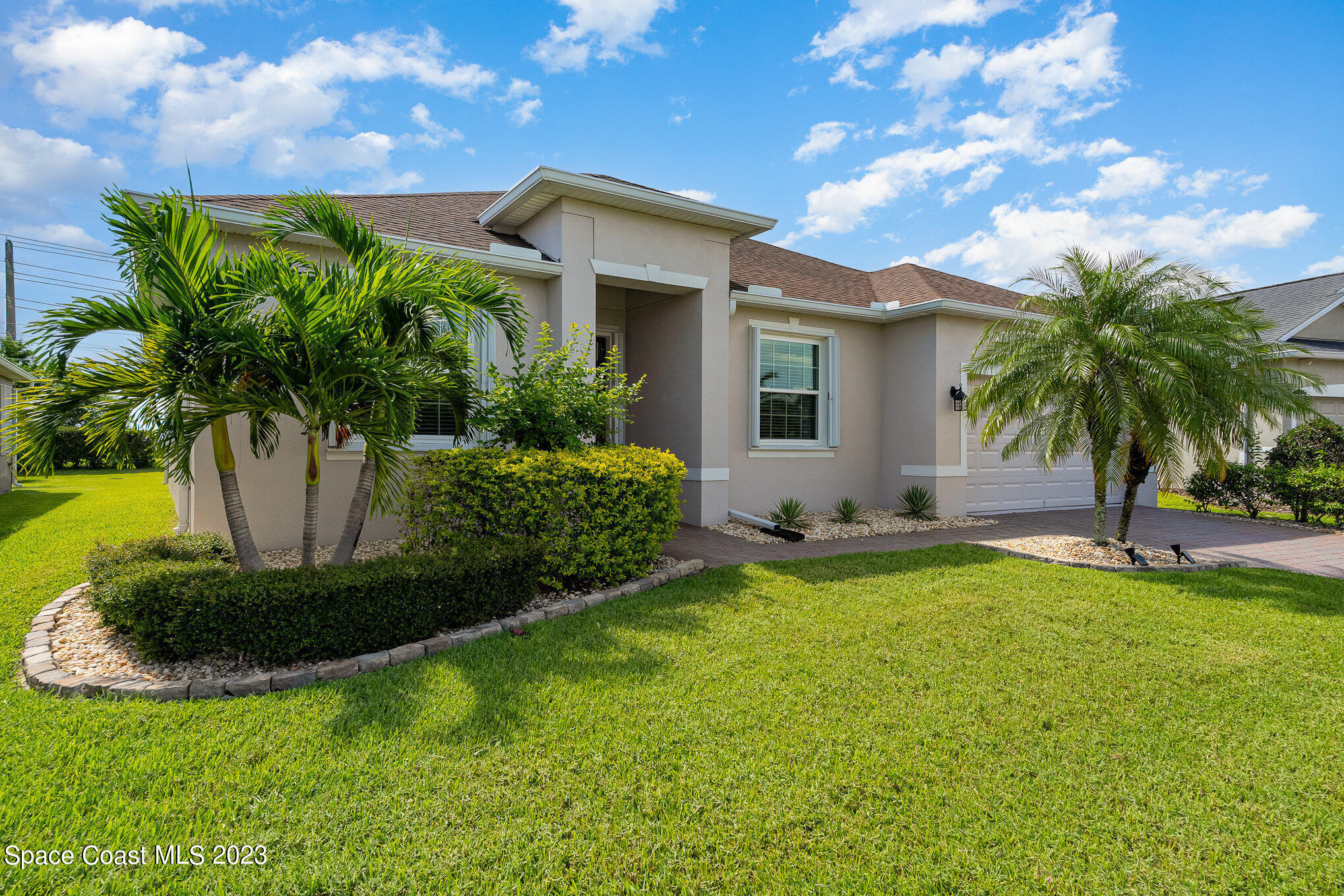 3545 Sansome Circle Melbourne, FL 32940 - Photo 3 of 27 a view of a house with backyard and sitting area