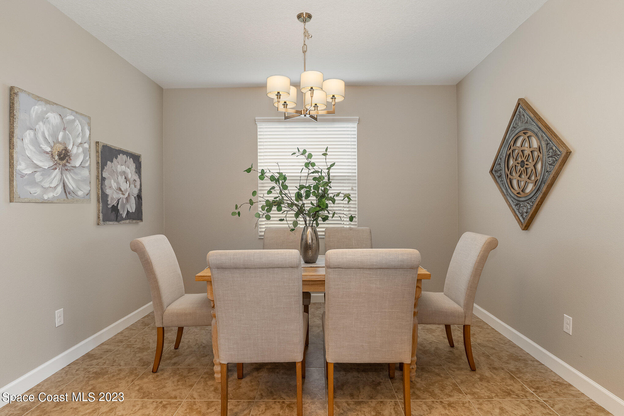 3545 Sansome Circle Melbourne, FL 32940 - Photo 7 of 27 a dining room with furniture and window