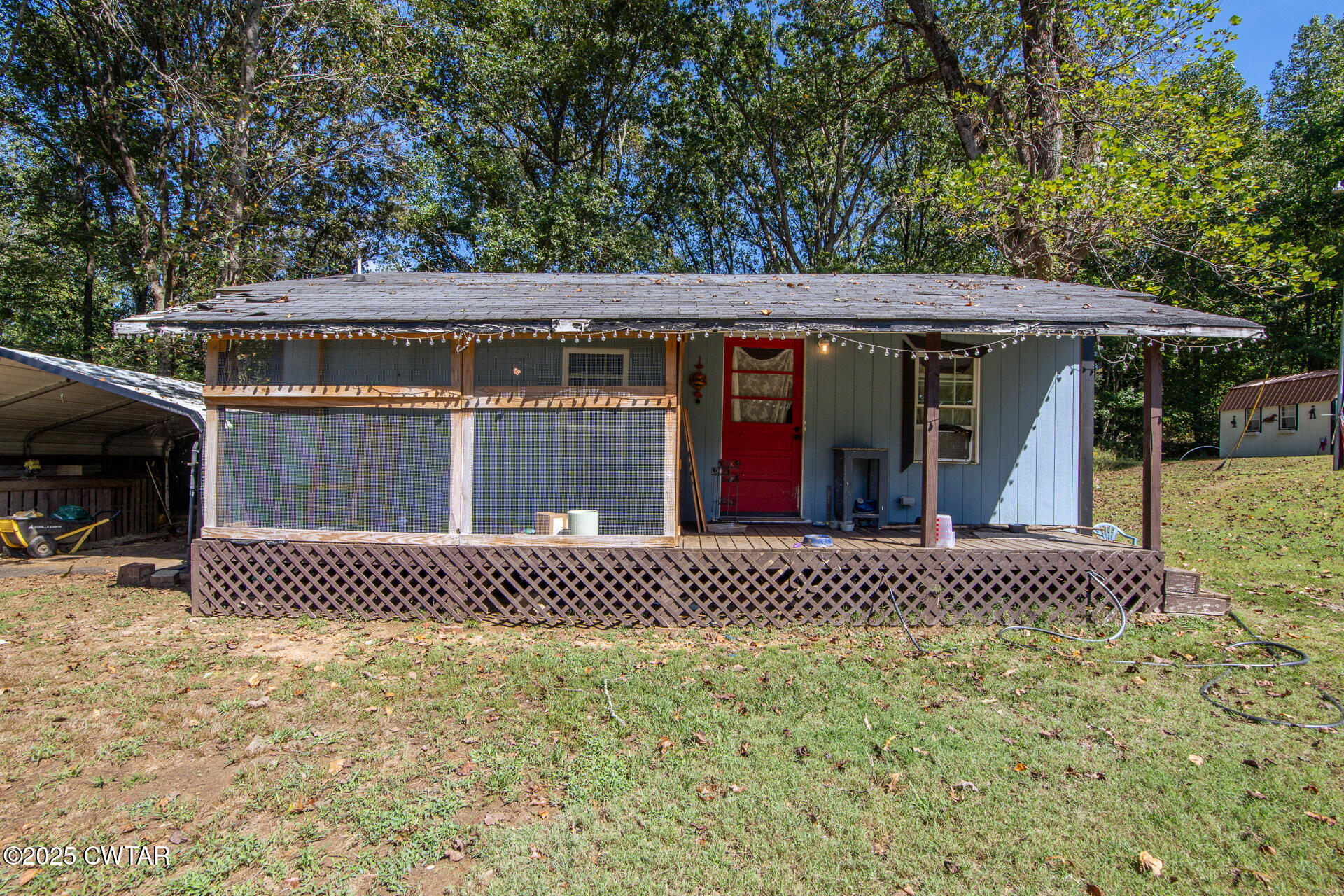 2020 Parkburg Road Medon, TN 38356 - Photo 2 of 24 a front view of a house with a garden