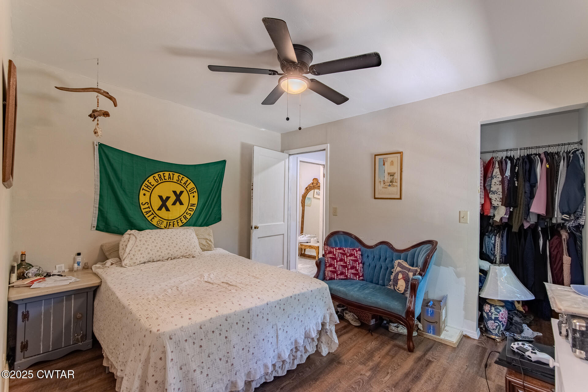 2020 Parkburg Road Medon, TN 38356 - Photo 9 of 24 a bedroom with a bed and wooden floor