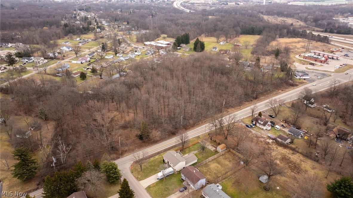 0 Salt Springs Road McDonald, OH 44437 - Photo 9 of 13 Aerial view of property and surrounding area with nearby suburban area