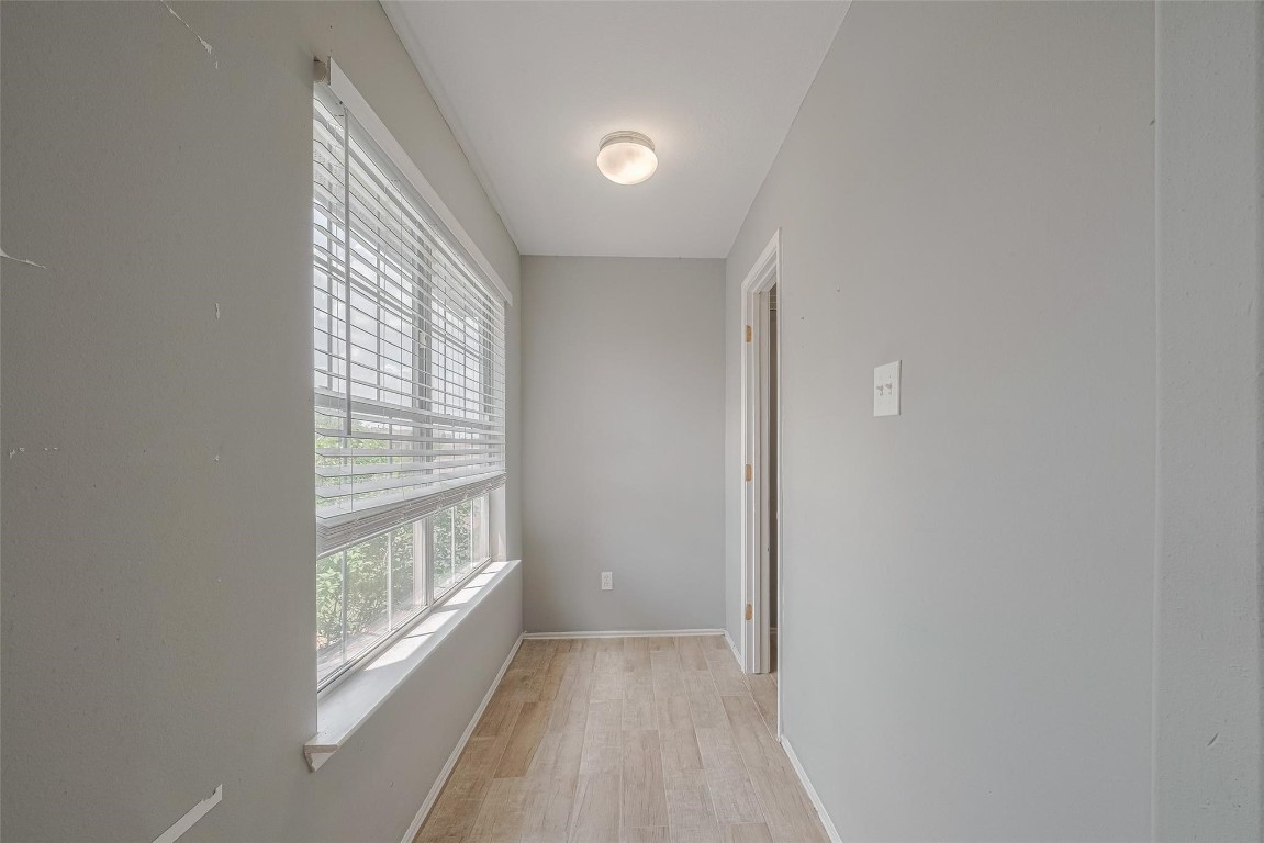 9926 Myrtle Field Lane Houston, TX 77044 - Photo 30 of 33 a view of an empty room with a window