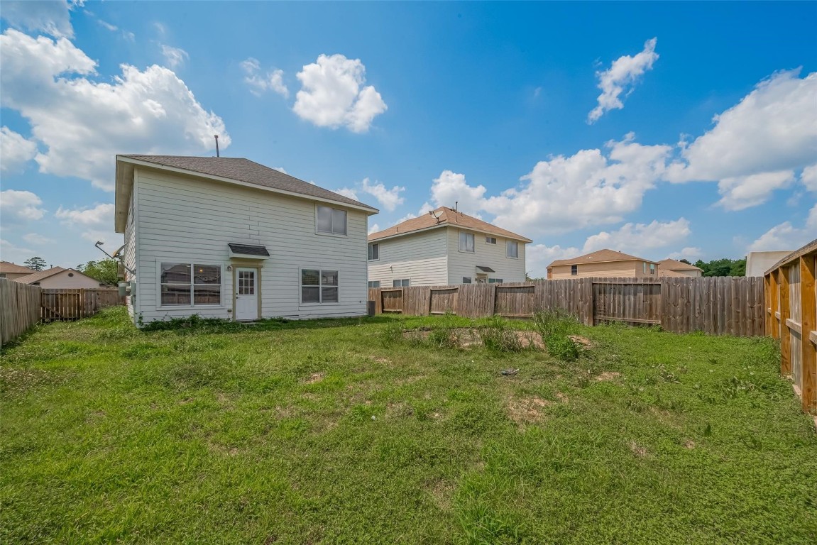 9926 Myrtle Field Lane Houston, TX 77044 - Photo 33 of 33 a view of a house with backyard
