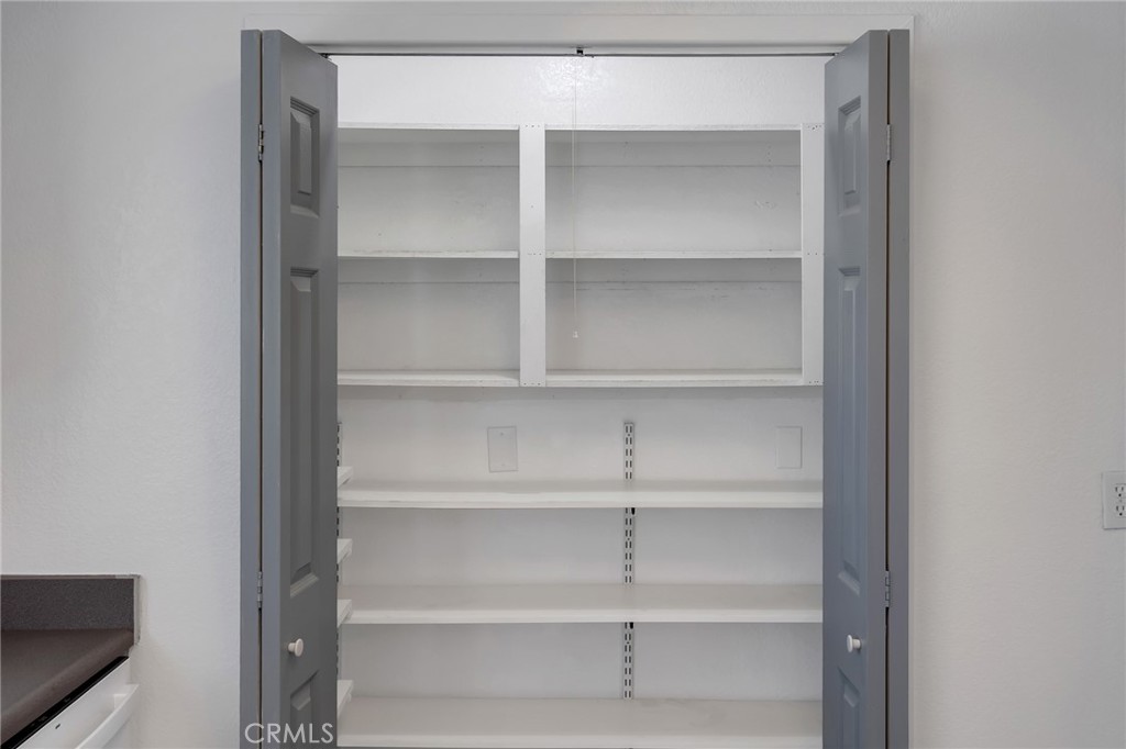 12736 Oasis Road Pinon Hills, CA 92372 - Photo 12 of 33 a view of an empty walk in closet