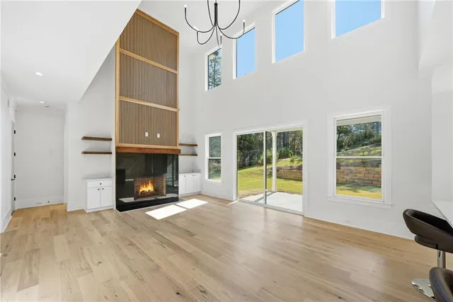 a view of staircase with white walls and windows