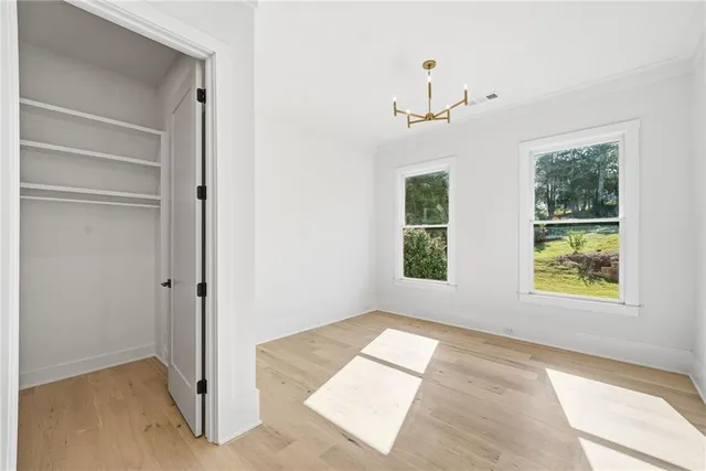a bathroom with a toilet sink and a mirror