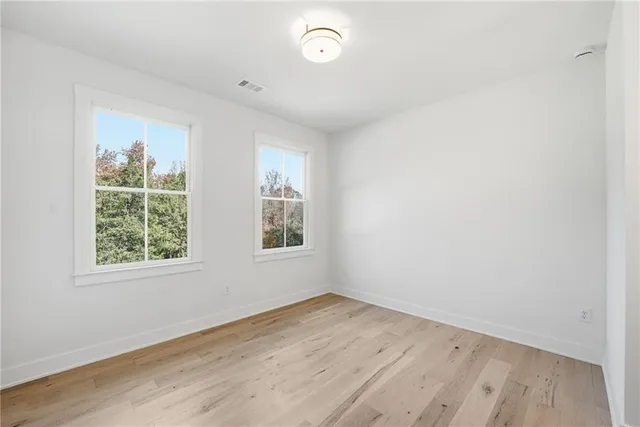a bathroom with a double vanity sink mirror and