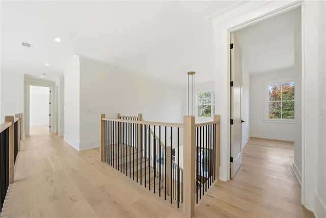 a bathroom with a sink toilet and a mirror