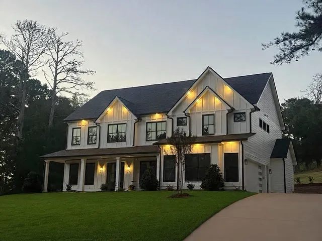 a front view of a house with a yard