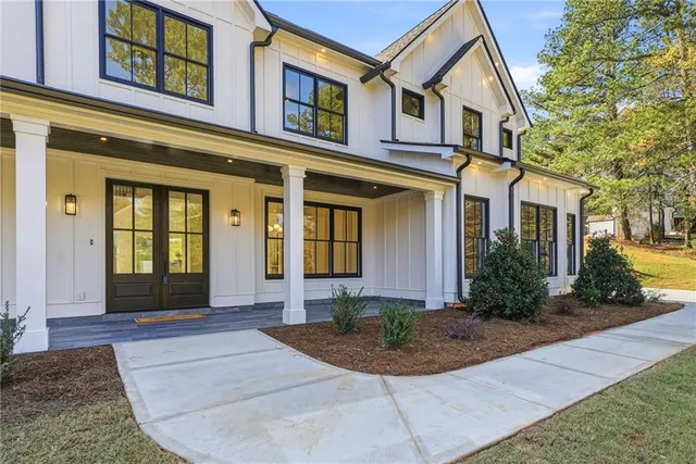 a picture of a bathroom with a shower